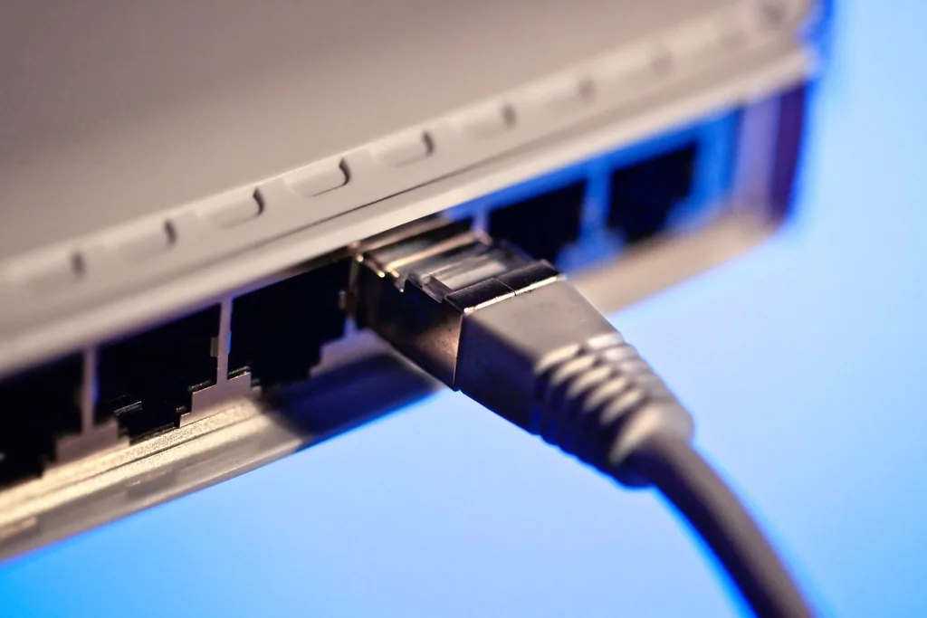 An Ethernet cable plugged into a network port